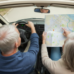 Elderly couple in motorhome with map, road trip navigation adventure